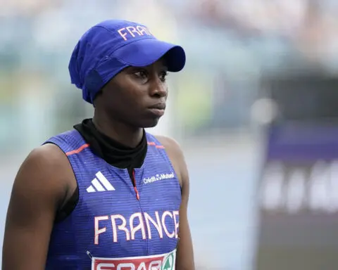 French sprinter to take part in Opening Ceremony despite not being allowed to wear a headscarf