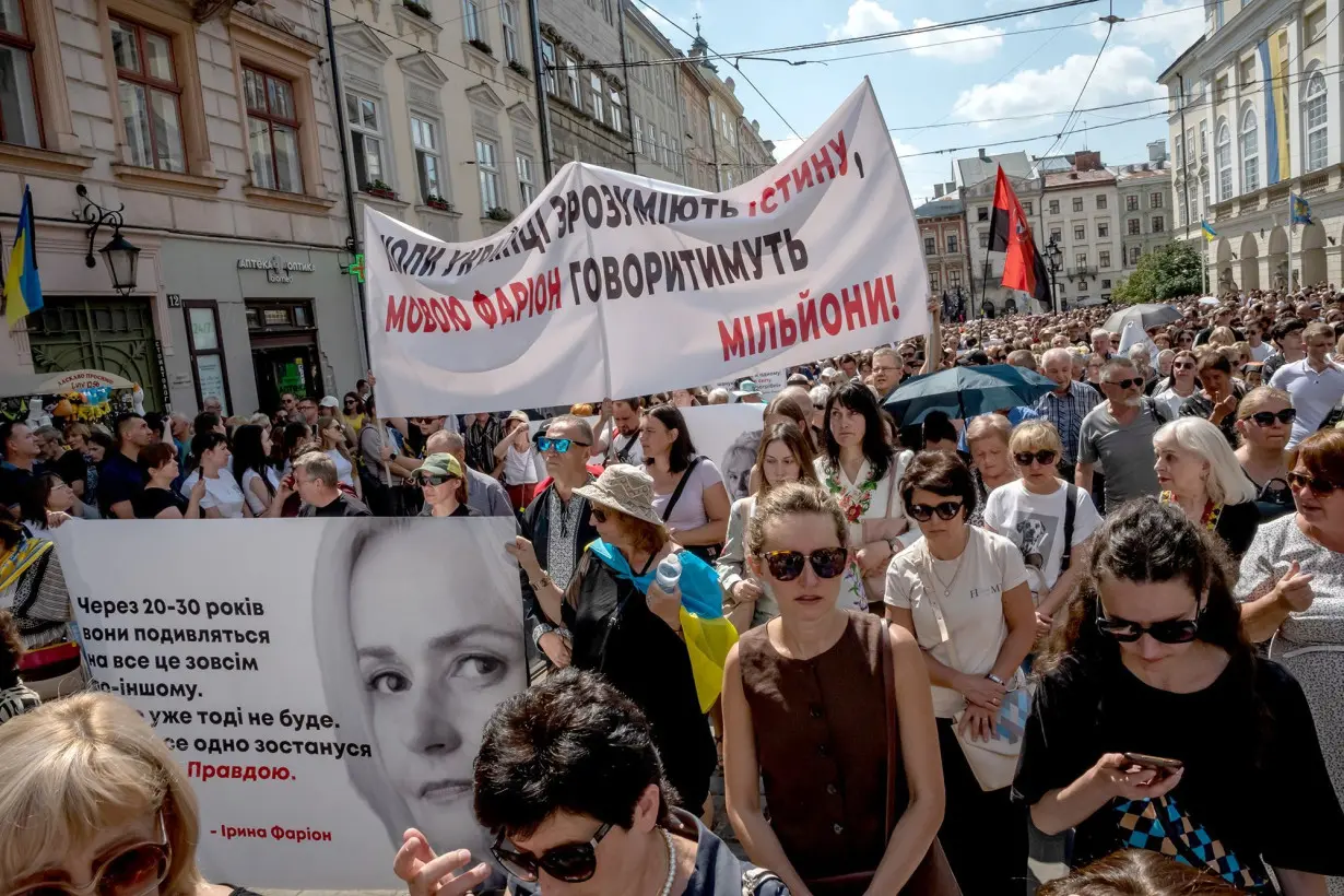 Hundreds of people attend the funeral of Iryna Farion at the Garrison Church of the Holy Apostles Peter and Paul in Lviv, Ukraine, on July 22.