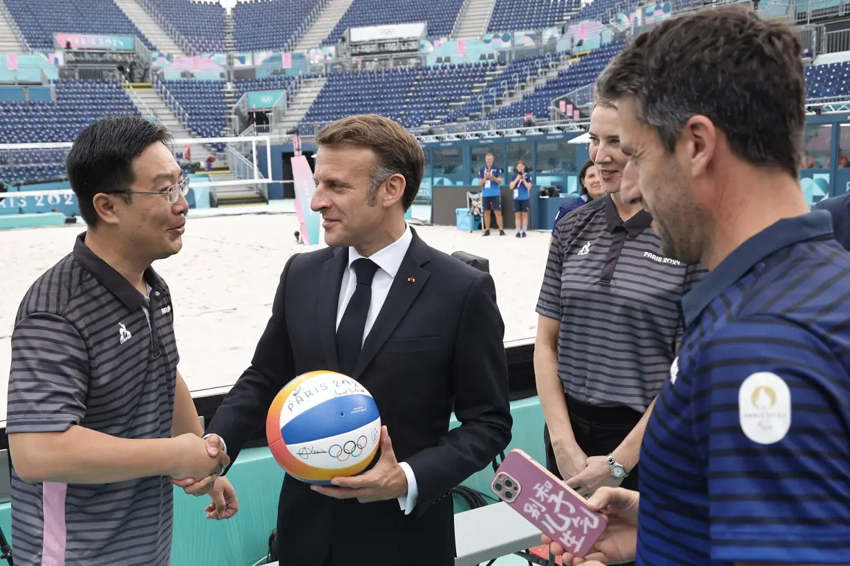 French President Macron visits Olympic venue by the Eiffel Tower in Paris