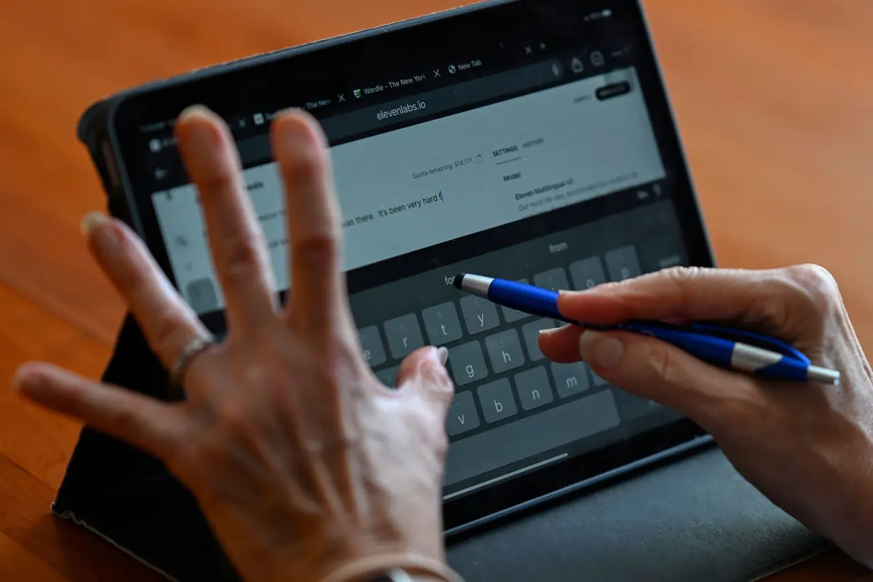 Rep. Jennifer Wexton uses an AI program on her iPad at her home in Leesburg, Virginia, on July 19, 2024.