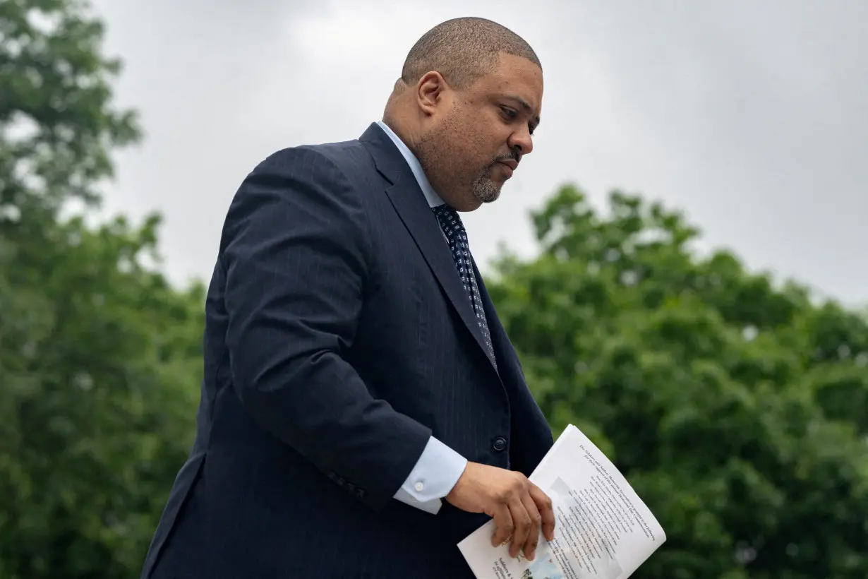 FILE PHOTO: Manhattan District Attorney Alvin Bragg leaves a podium during the Memorial Day Ceremony at Soldiers and Sailors Monument in New York