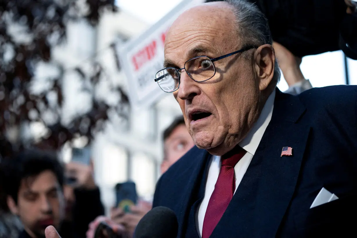 FILE PHOTO: Former New York Mayor Rudy Giuliani departs defamation lawsuit at the District Courthouse in Washington