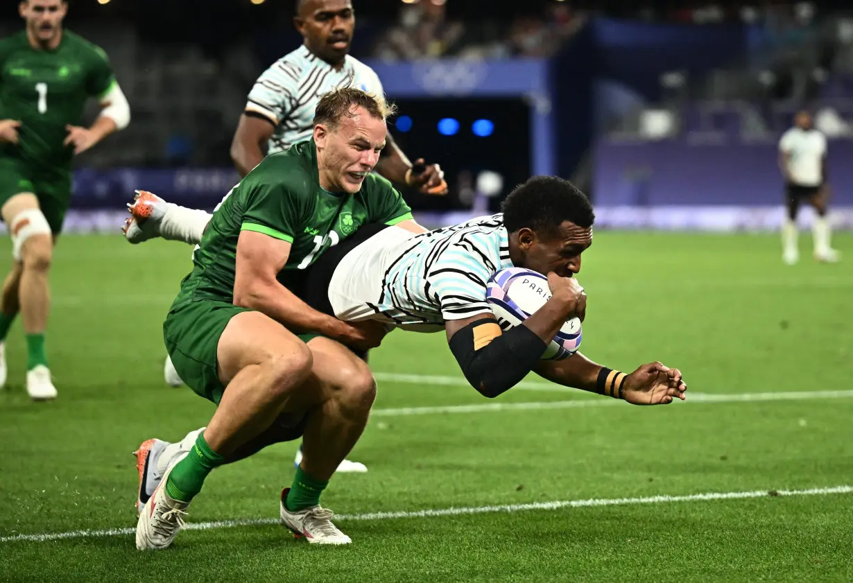 Olympics-Rugby Sevens-South Africa shock NZ; France, Fiji and Australia advance