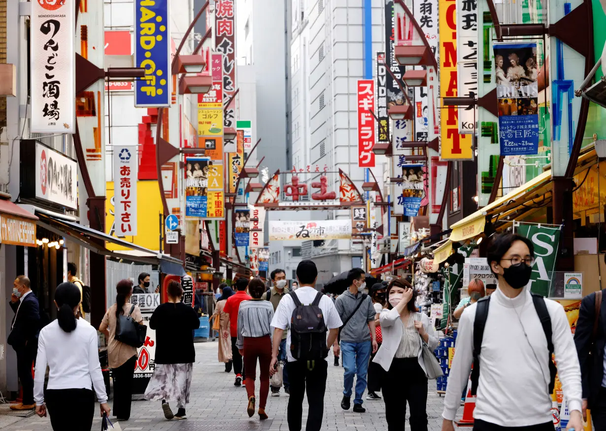 People make their way at Ameyoko shopping district in Tokyo