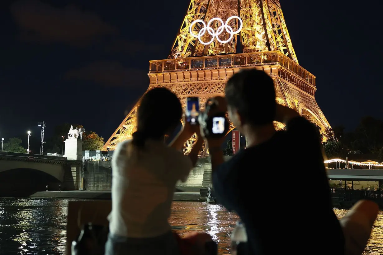 The Eiffel Tower is decorated with the Olympic rings on July 21, in Paris, France. The city is gearing up to host the XXXIII Olympic Summer Games from July 26 to August 11.