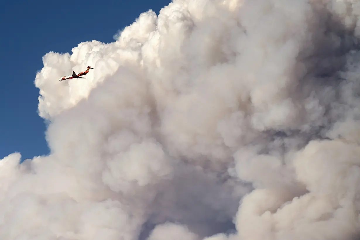 California's largest wildfire explodes in size as fires rage across US West