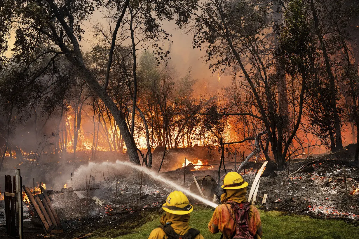 California's largest wildfire explodes in size as fires rage across US West