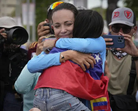 Venezuela opposition leader provides hope for many, even though she isn't on the presidential ballot