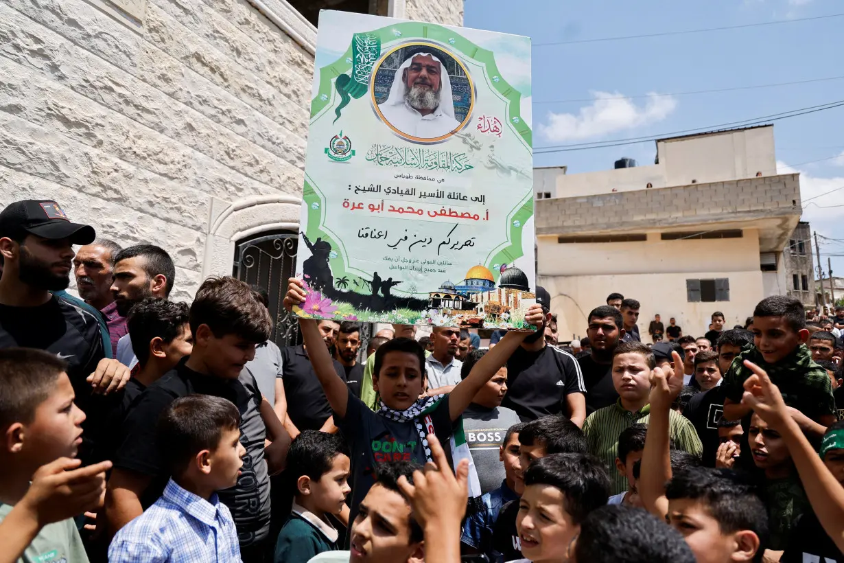 Palestinians protest the death of Mustafa Muhammad Abu Ara, a Hamas leader in the West Bank, in Aqaba, near Tubas