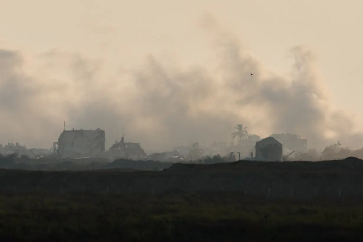 Smoke rises over Gaza, as seen from Israel