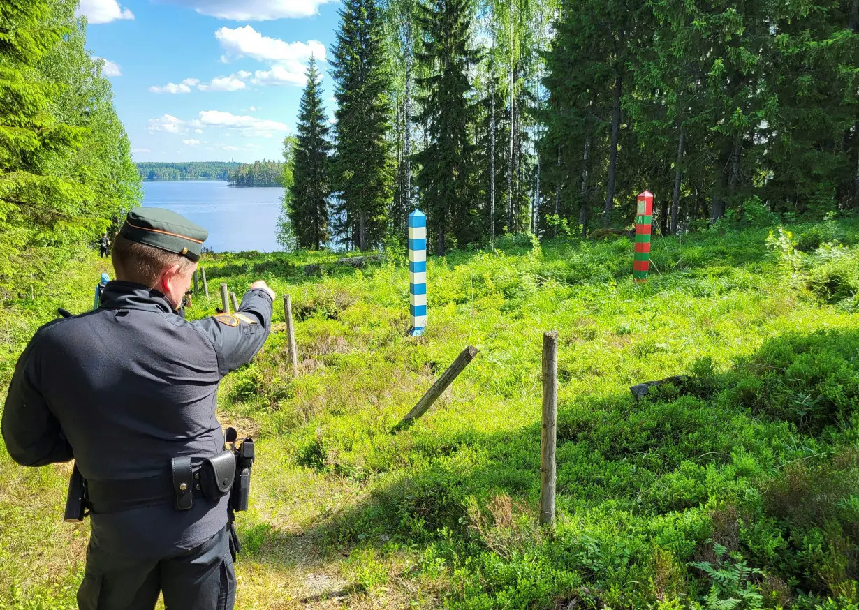 FILE PHOTO: Finland readies to bar new migrant route via Russia to Europe