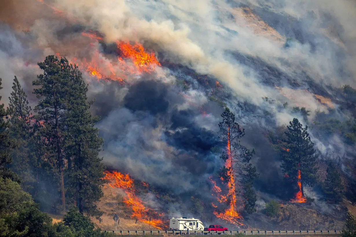 California's largest wildfire explodes in size as fires rage across US West