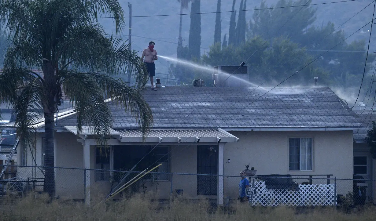 California's largest wildfire explodes in size as fires rage across US West