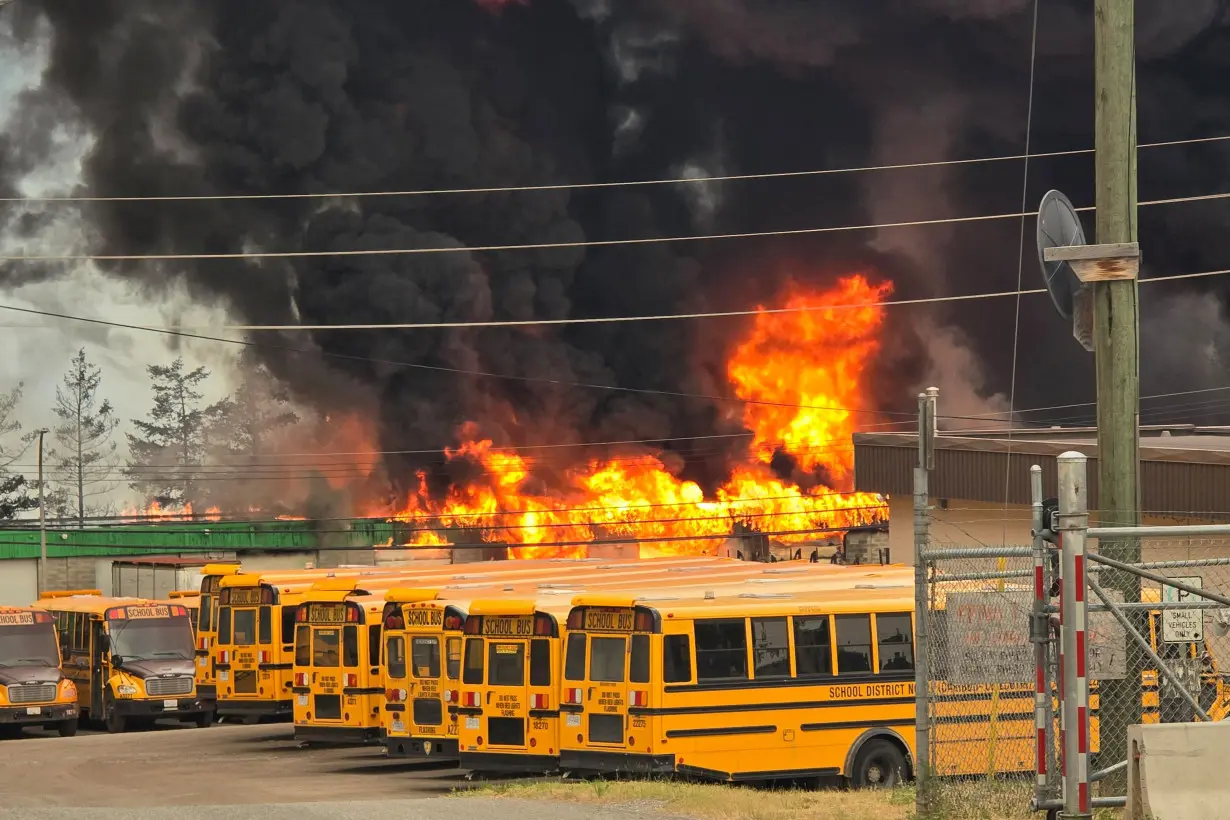 FILE PHOTO: Wildfire burns on the edge of the Cariboo region city of Williams Lake