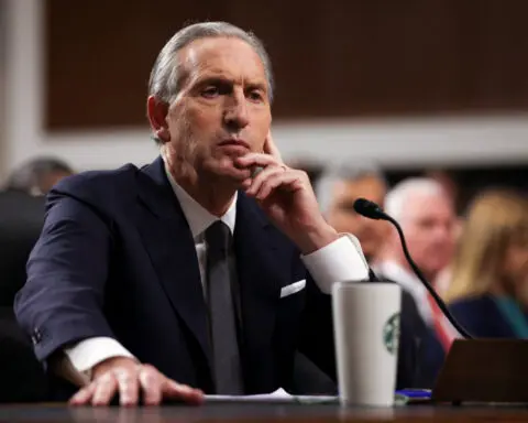 Starbucks' ex-CEO Schultz opposes potential settlement with Elliott, FT reports