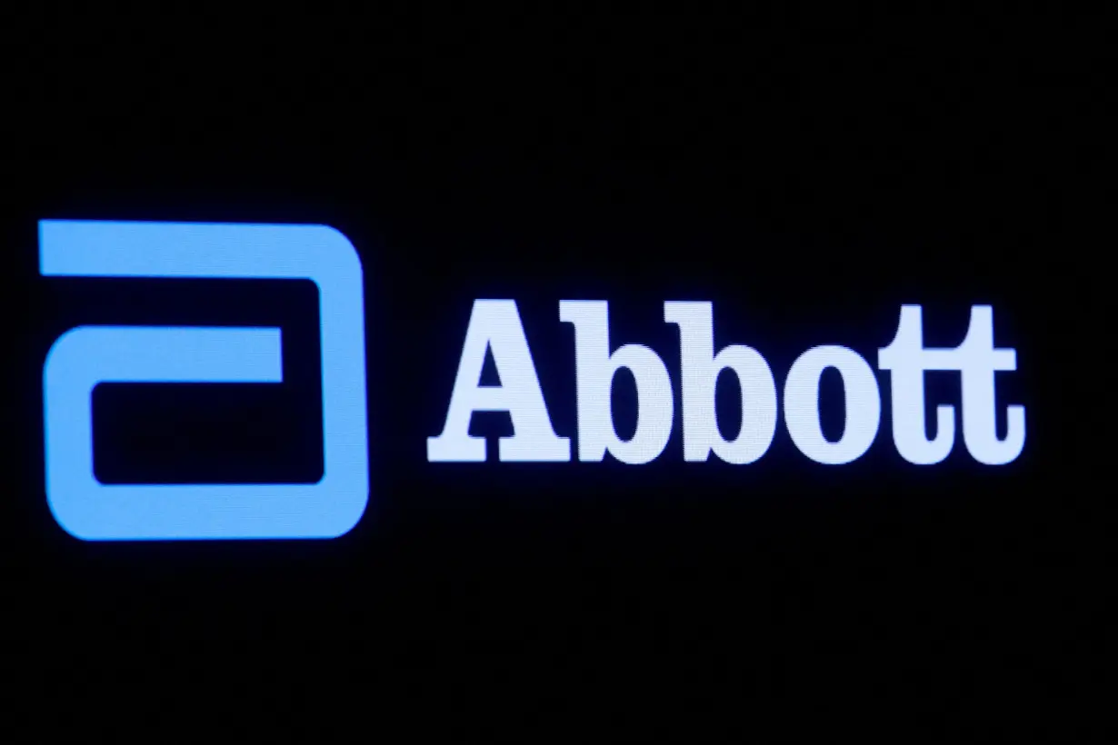 FILE PHOTO: Abbott Laboratories logo is displayed on a screen at the NYSE in New York