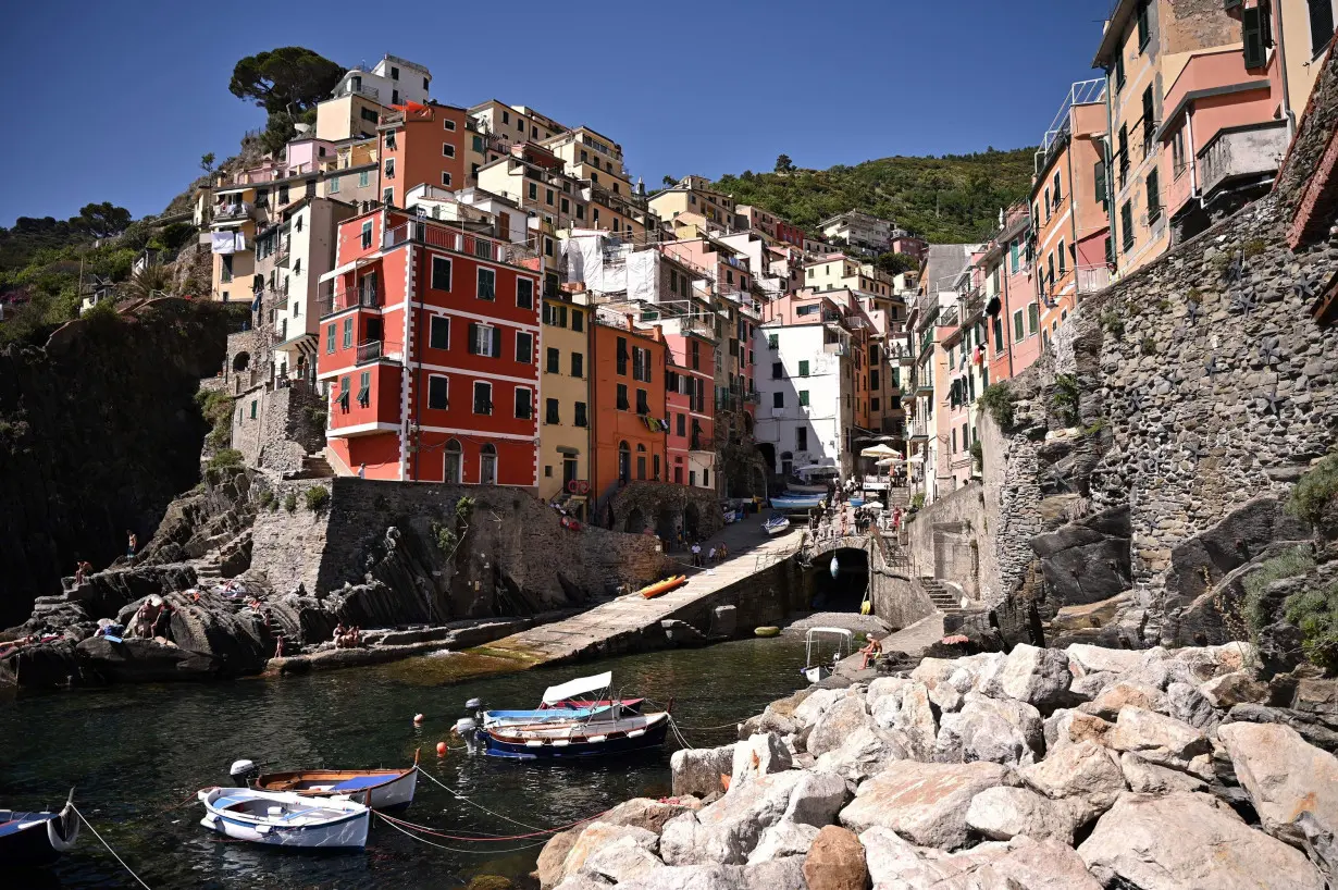 Brightly colored buildings are seen in the village of Riomaggiore, one of the five villages comprising Cinque Terre. The 