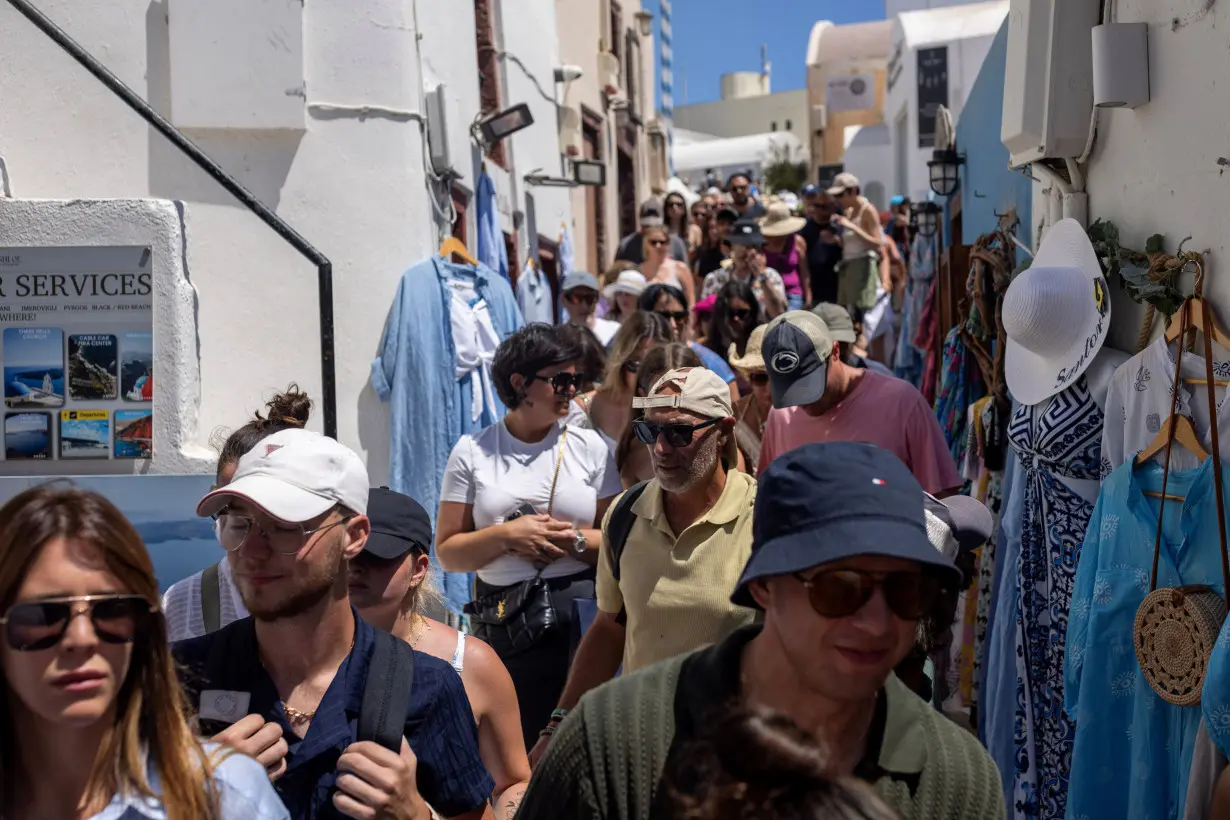 Greece's Santorini bursts with tourists as locals call for a cap