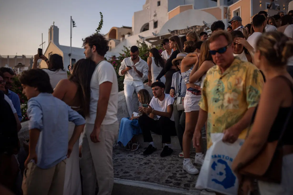 Greece's Santorini bursts with tourists as locals call for a cap