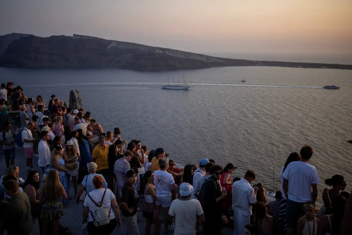 Greece's Santorini bursts with tourists as locals call for a cap