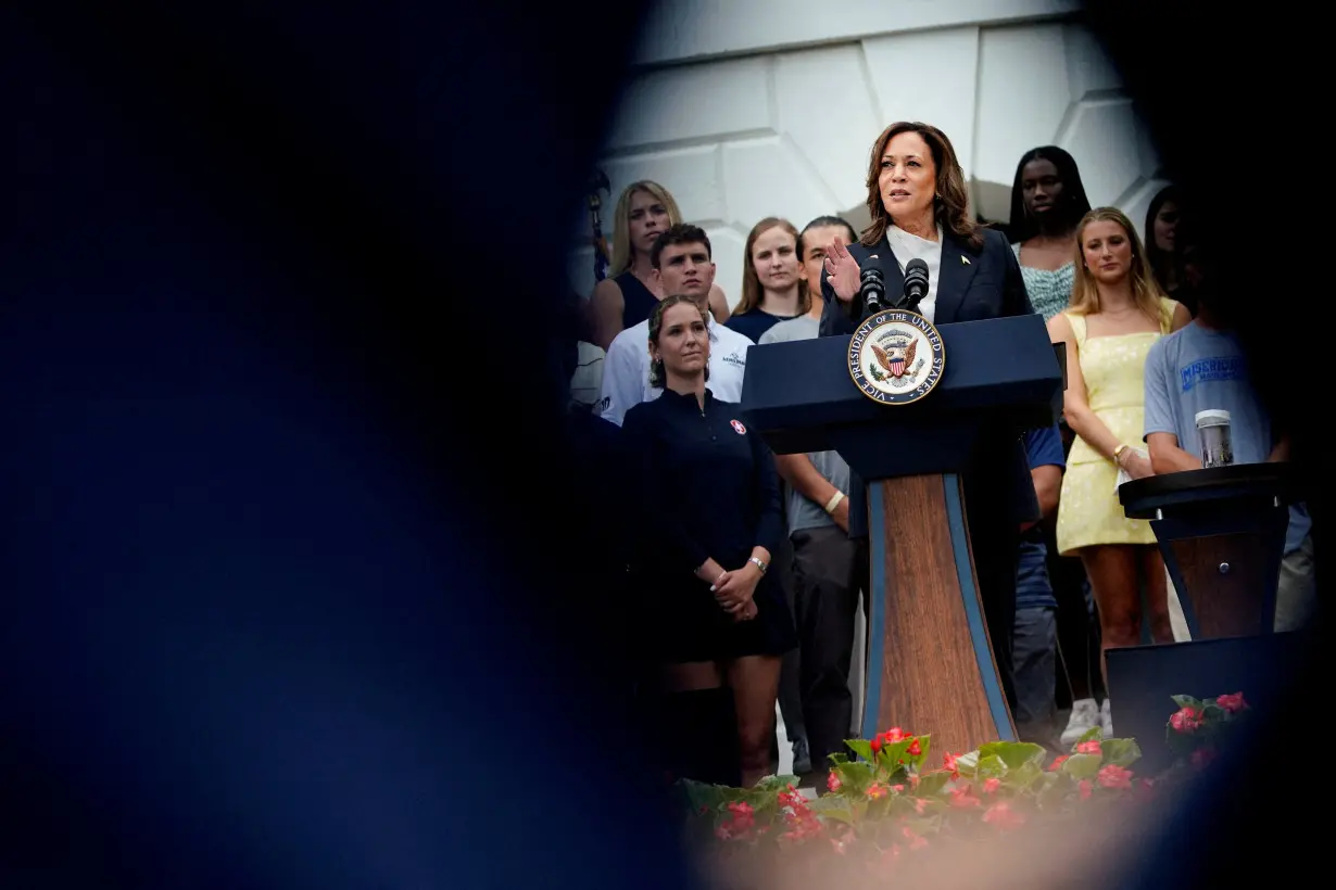 FILE PHOTO: U.S. Vice President Kamala Harris delivers remarks to the women and men's National Collegiate Athletic Association (NCAA) Champion teams at the White House in Washington