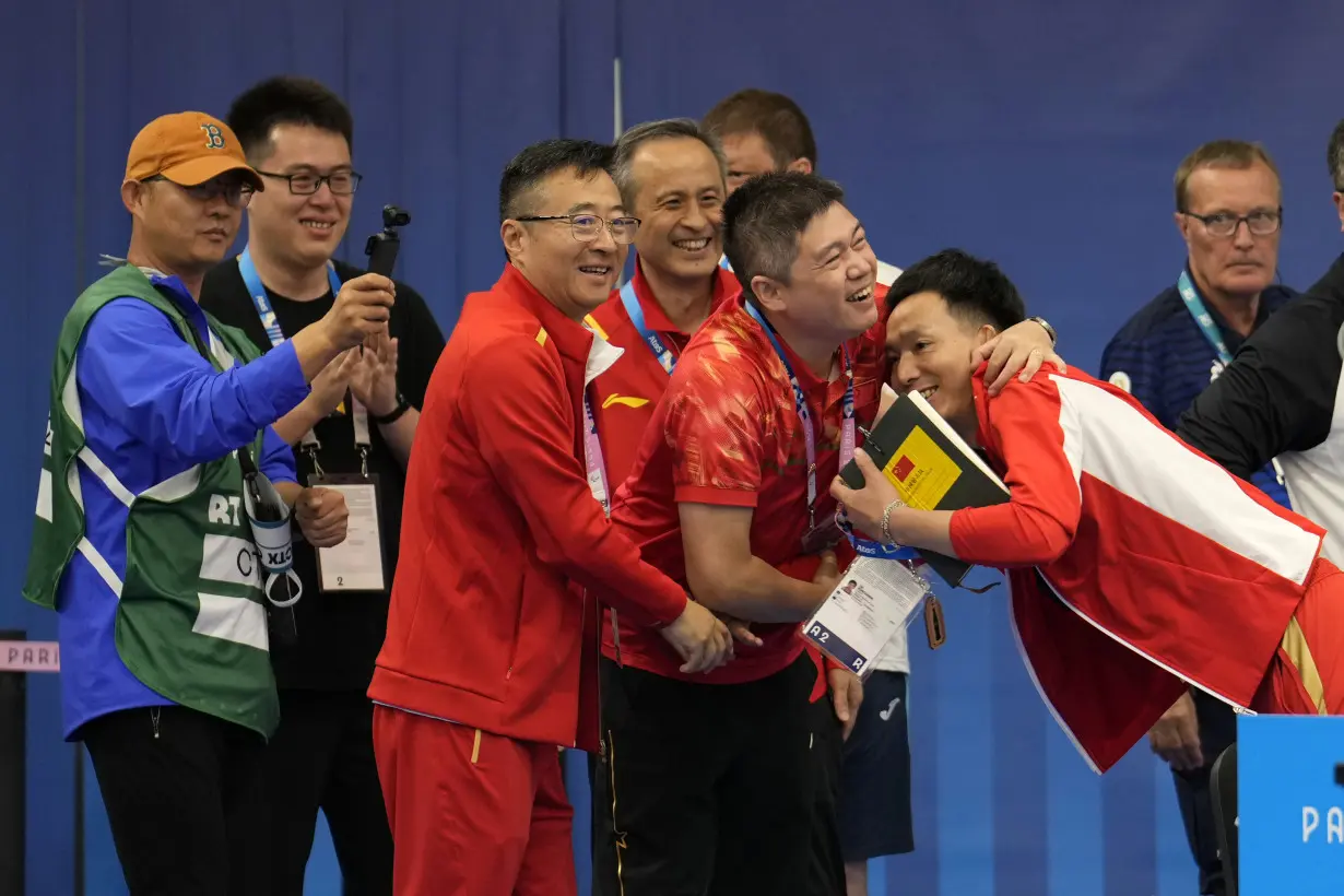 China wins the first gold medal of the 2024 Olympics in mixed team air rifle shooting