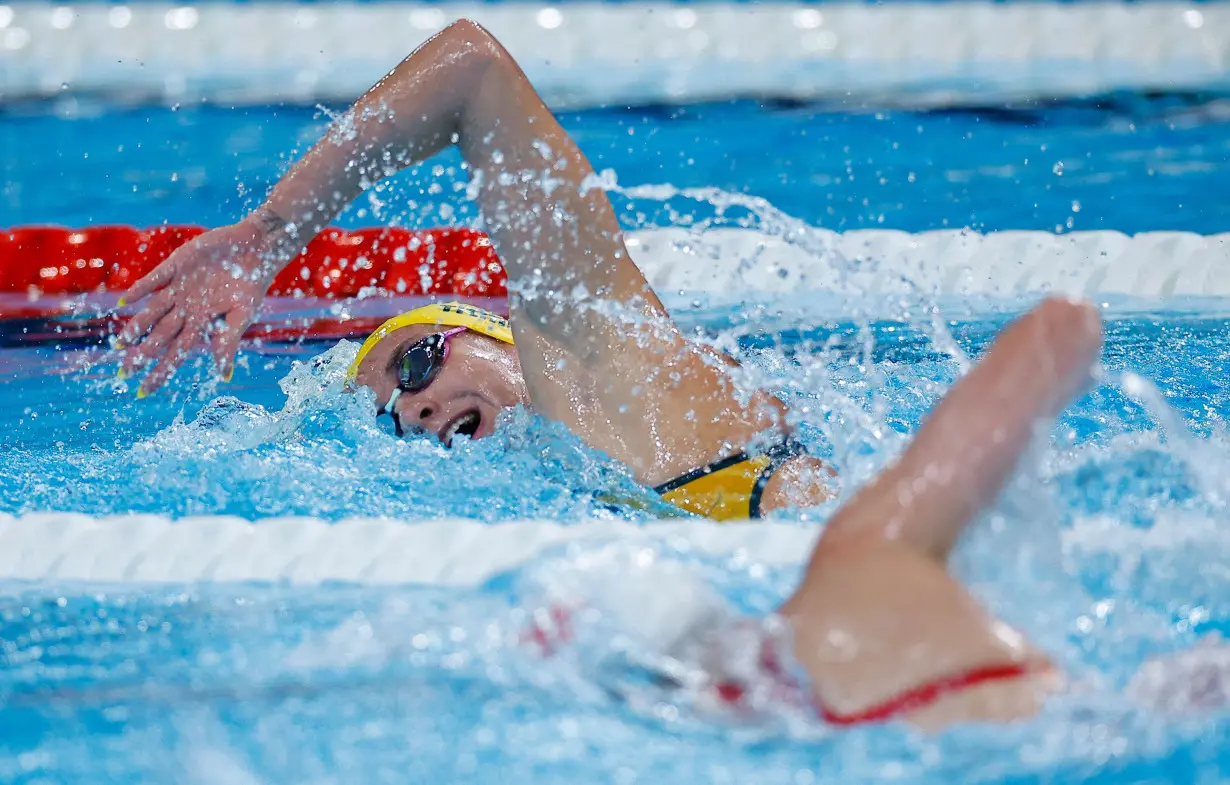 Olympics-Swimming-Ledecky sets up 400m showdown with champion Titmus