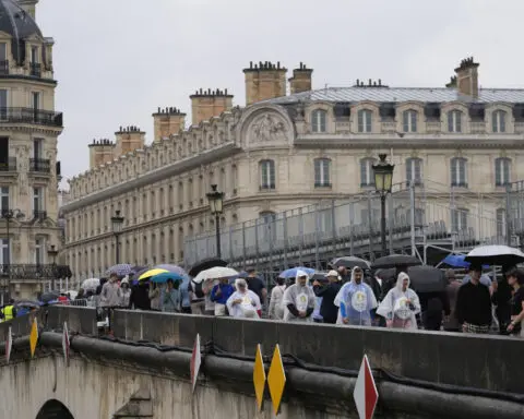 Paris barricades start to come down after opening ceremony on the Seine, but many still struggling