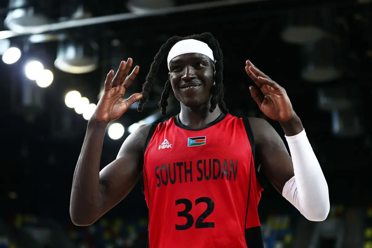 Gabriel celebrates after a victory against Great Britain in an Olympic warmup match.