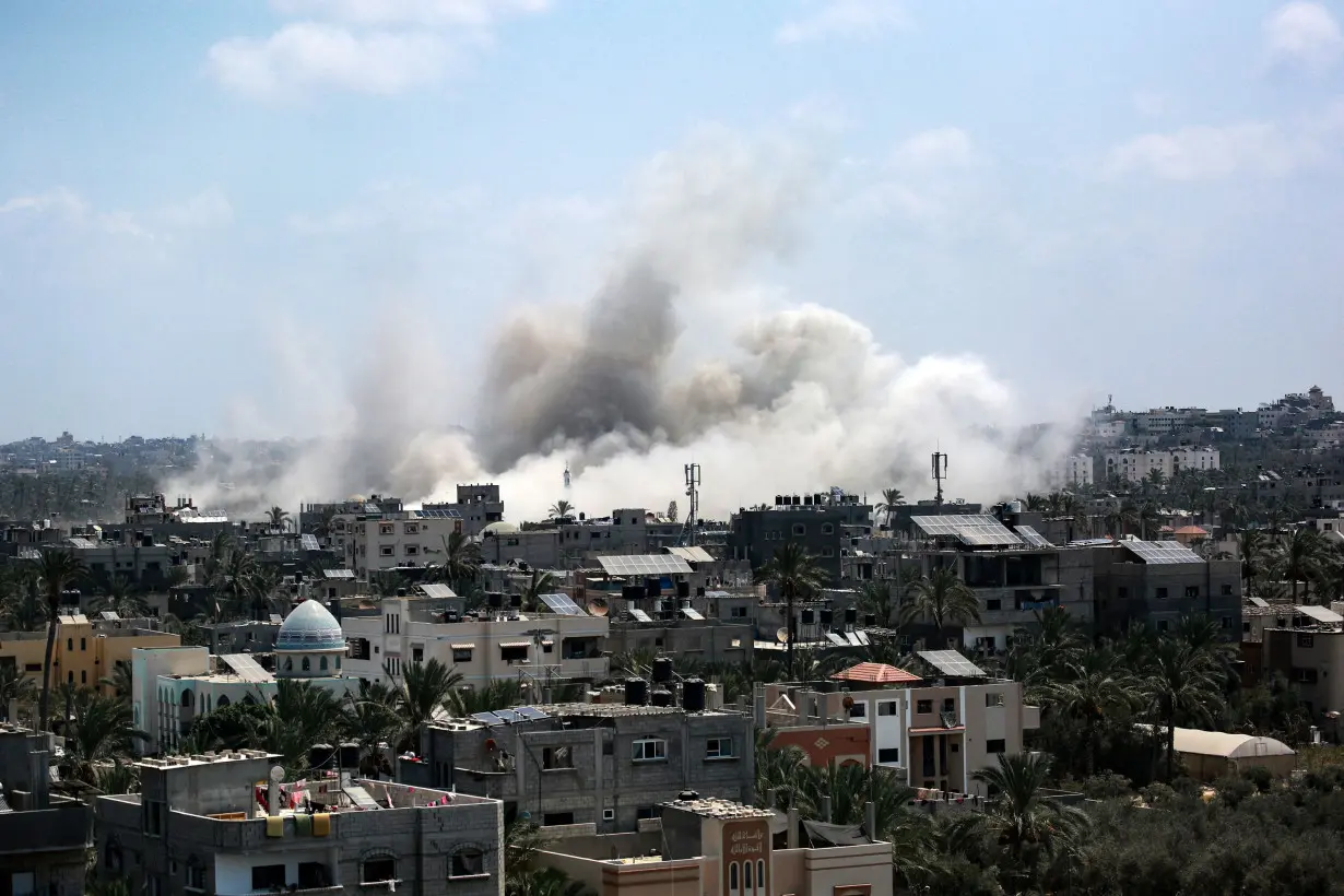 Smoke rises during an Israeli strike in Deir el-Balah in the central Gaza Strip on July 27, amid the ongoing conflict between Israel and the Palestinian militant group Hamas.