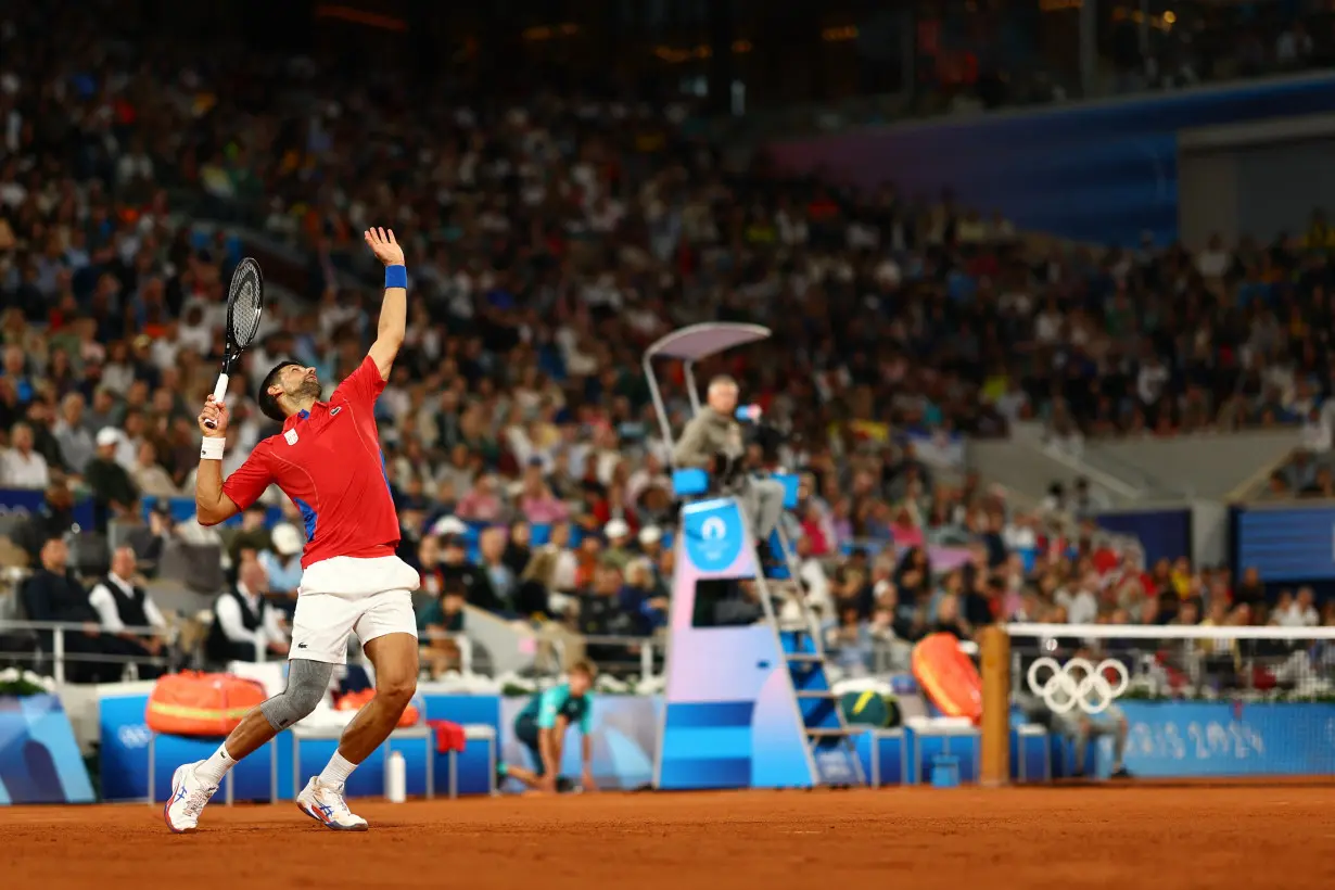 Olympics-Tennis-Unamused Djokovic questions Olympic eligibility rules after 53-minute romp