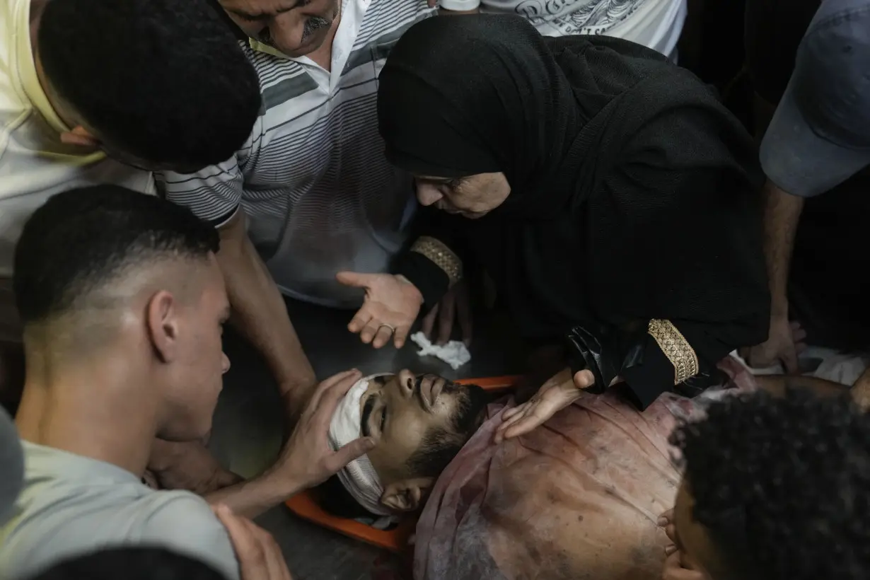 An Israeli airstrike hits a school sheltering people in Gaza, killing at least 30 including children