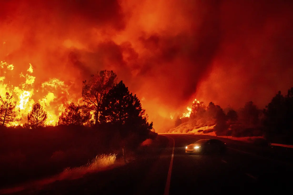 Firefighters helped by cooler weather battle blaze that has scorched area size of Los Angeles