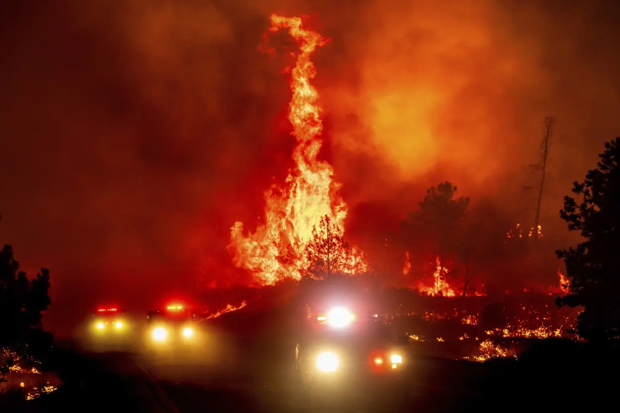 Firefighters helped by cooler weather battle blaze that has scorched area size of Los Angeles