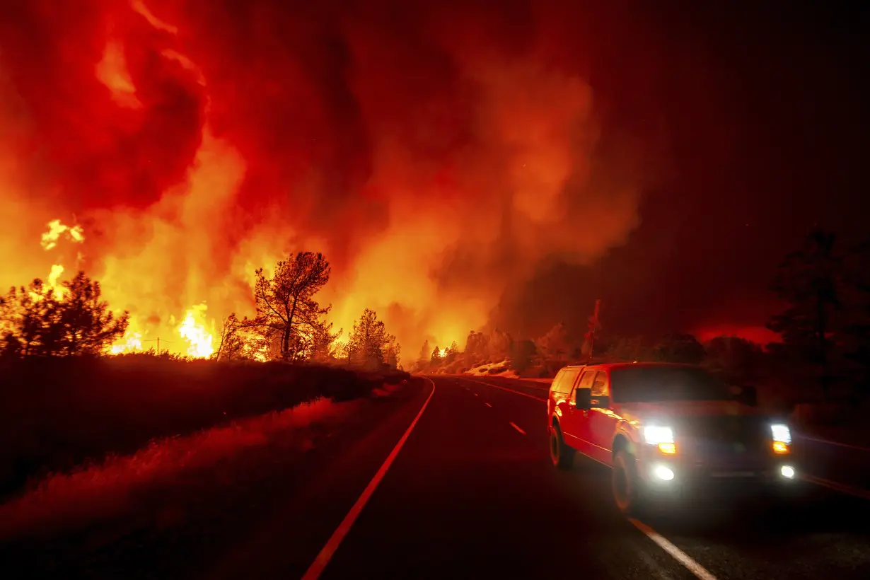 Firefighters helped by cooler weather battle blaze that has scorched area size of Los Angeles