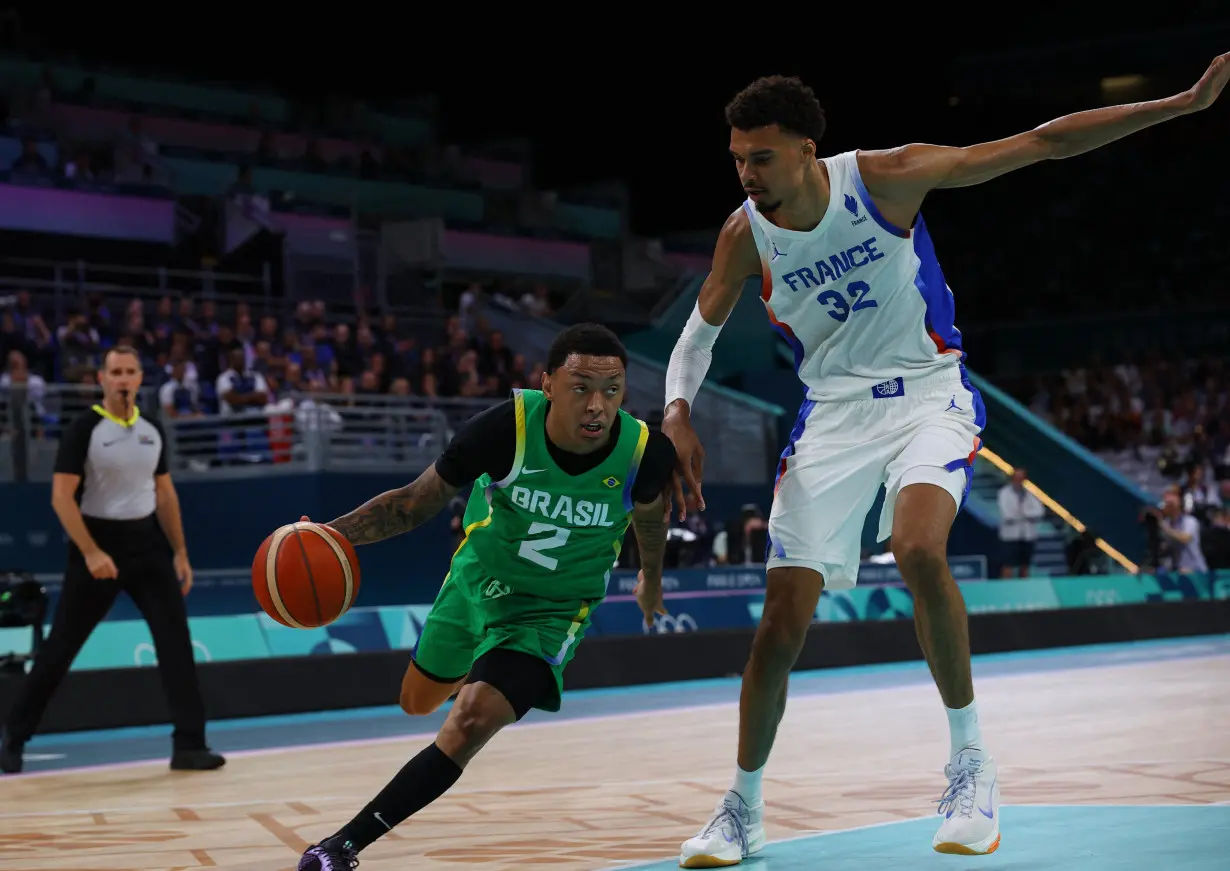 Olympics-Basketball-French fans roar their side to victory over Brazil in Lille