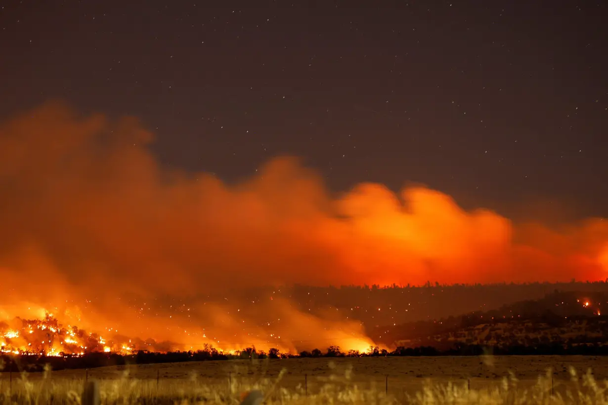 California wildfire explodes, becomes largest in US