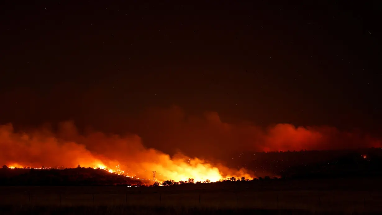 California wildfire explodes, becomes largest in US