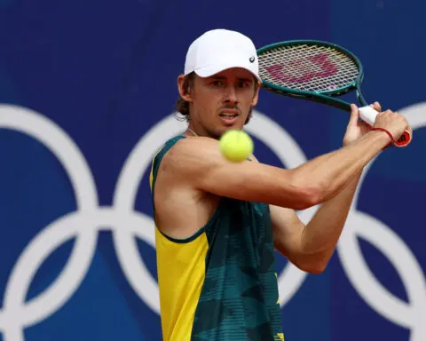 Olympics-Tennis-Australia's De Minaur withdraws from singles