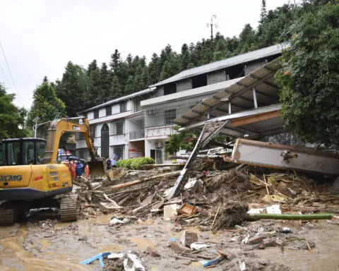 Mudslide kills 15 people near tourist site in China as rains from tropical storm Gaemi drench region