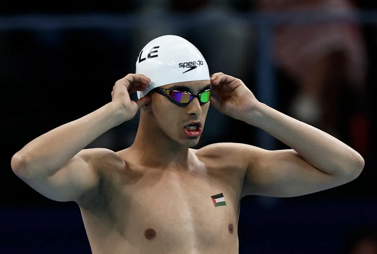 Swimming - Men's 100m Backstroke - Heats