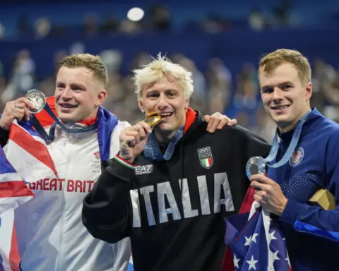 Martinenghi races from the shadows in Paris Olympics to beat Peaty and Qin in the 100 breaststroke