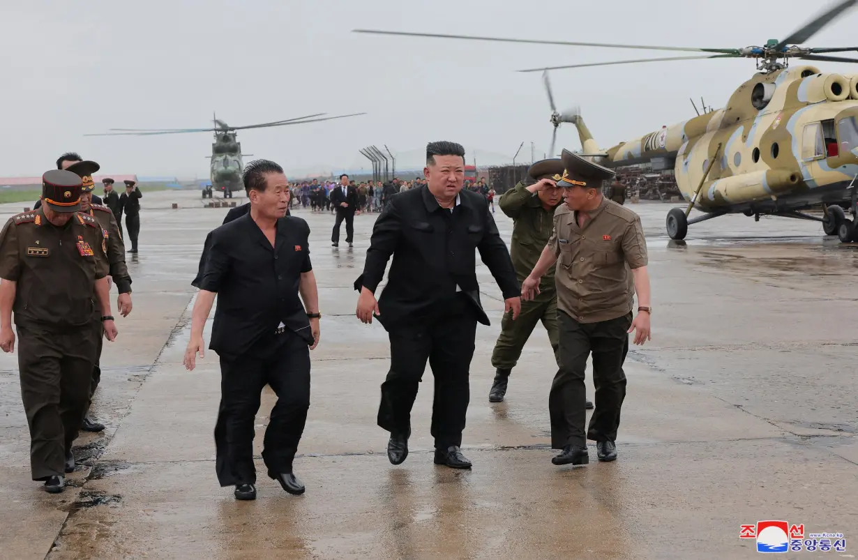 North Korean leader Kim Jong Un observes rescue efforts in flooded areas near the country's border with China, in North Pyongan Province