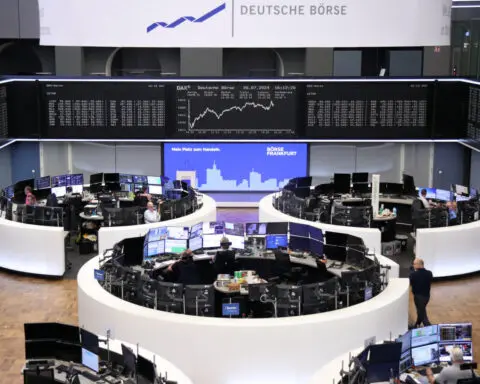 European shares close lower in lead-up to Fed, earnings