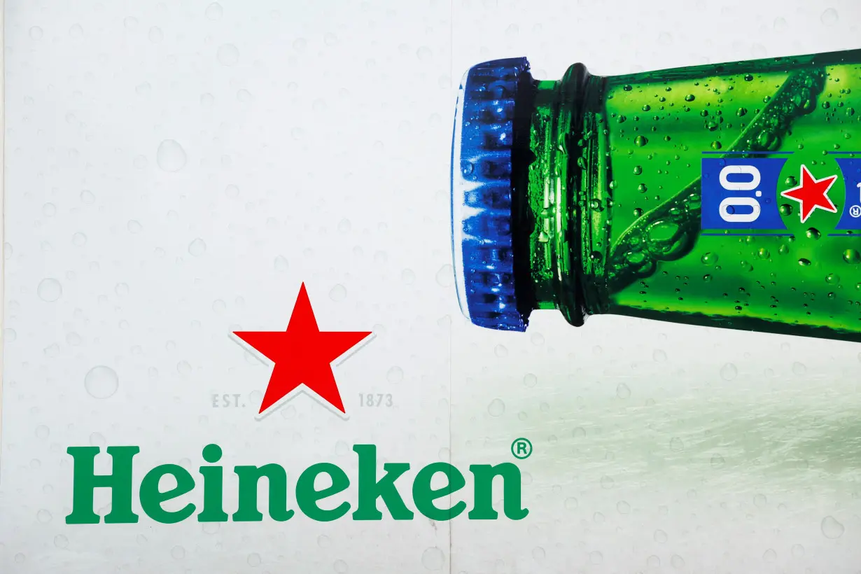 The logo of Heineken beer is seen on a delivery truck