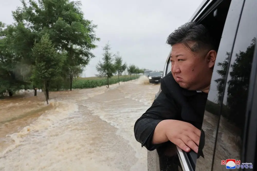 North Korea’s Kim ‘inspects’ flood response as thousands evacuated from China border region after heavy rains