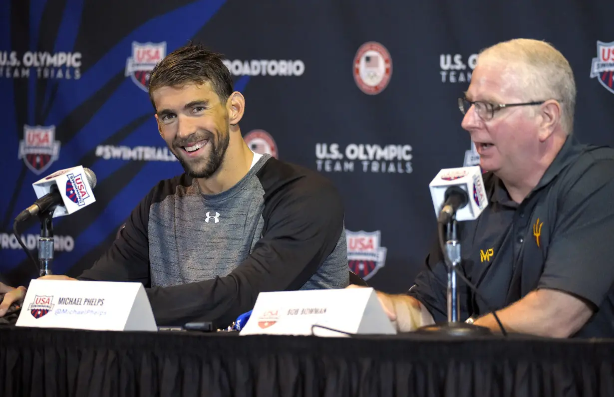 Longtime Phelps coach Bob Bowman was in tears watching new star pupil Léon Marchand win gold