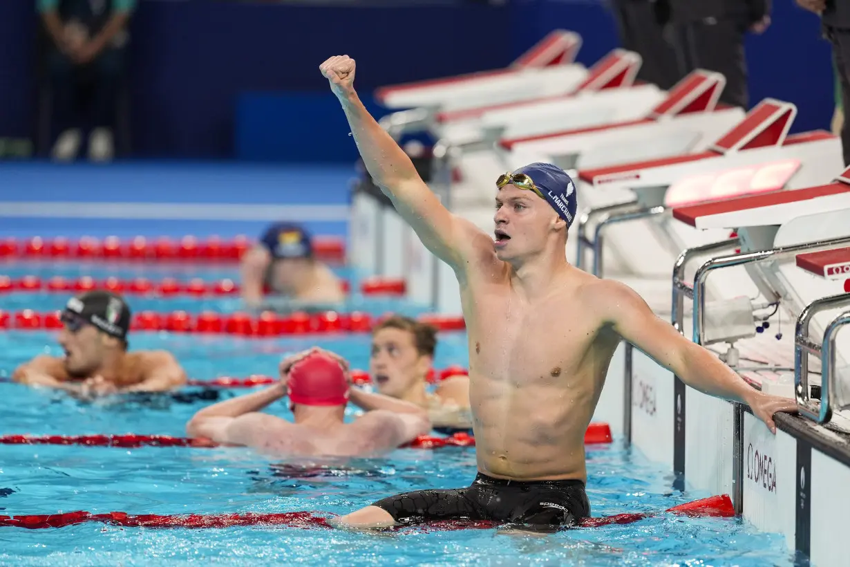 Longtime Phelps coach Bob Bowman was in tears watching new star pupil Léon Marchand win gold