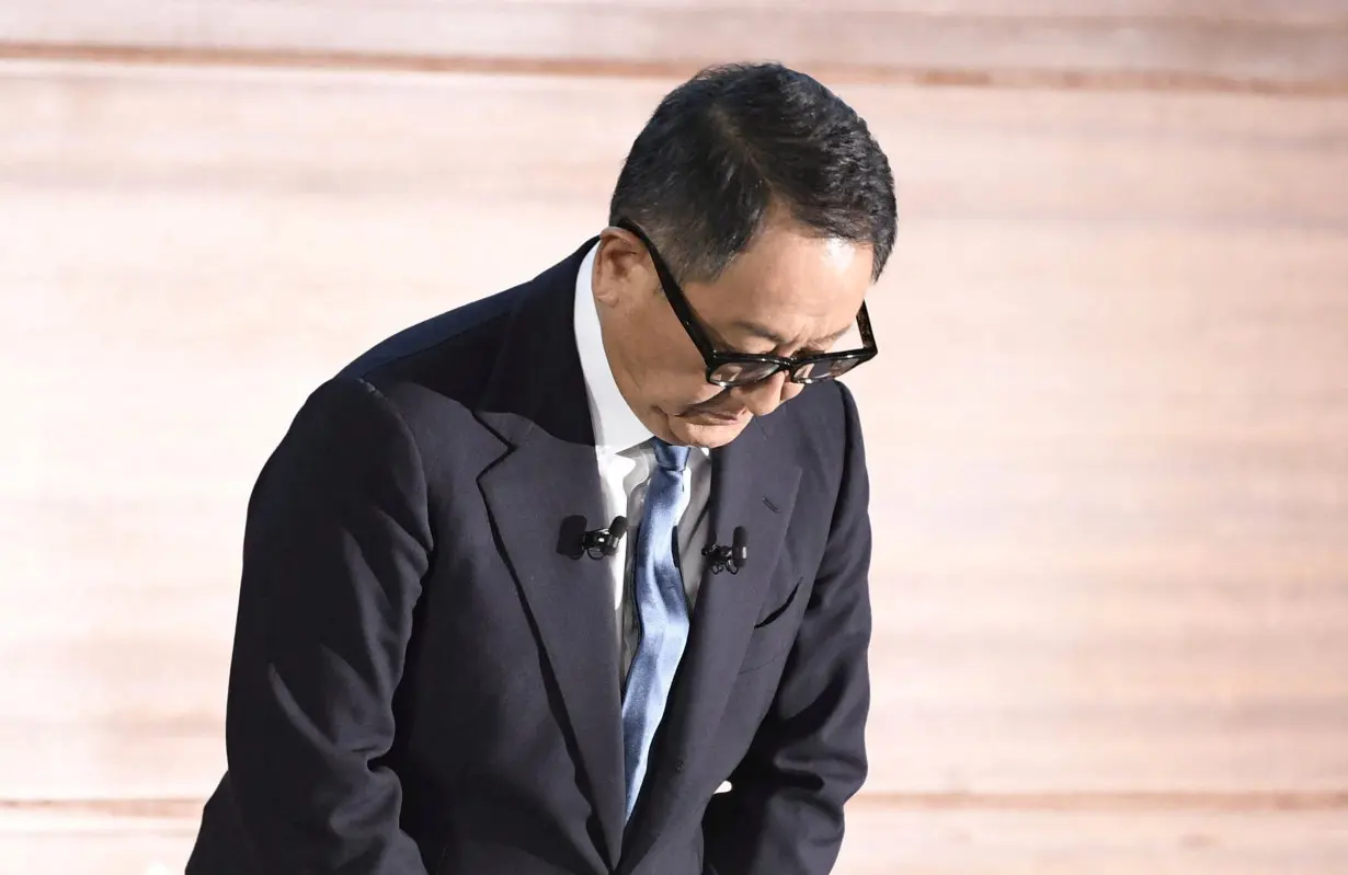 Toyota Motor's Chairman Akio Toyoda apologizes for scandals at three group companies during a press conference in Nagoya