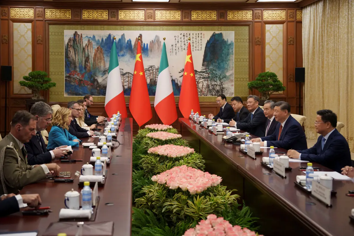 Chinese President Xi Jinping and his delegation attends a meeting with Italian Premier Giorgia Meloni, at the Diaoyutai State Guesthouse in Beijing